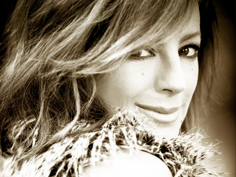 Sepia toned photo of Sarah McLachlan smiling